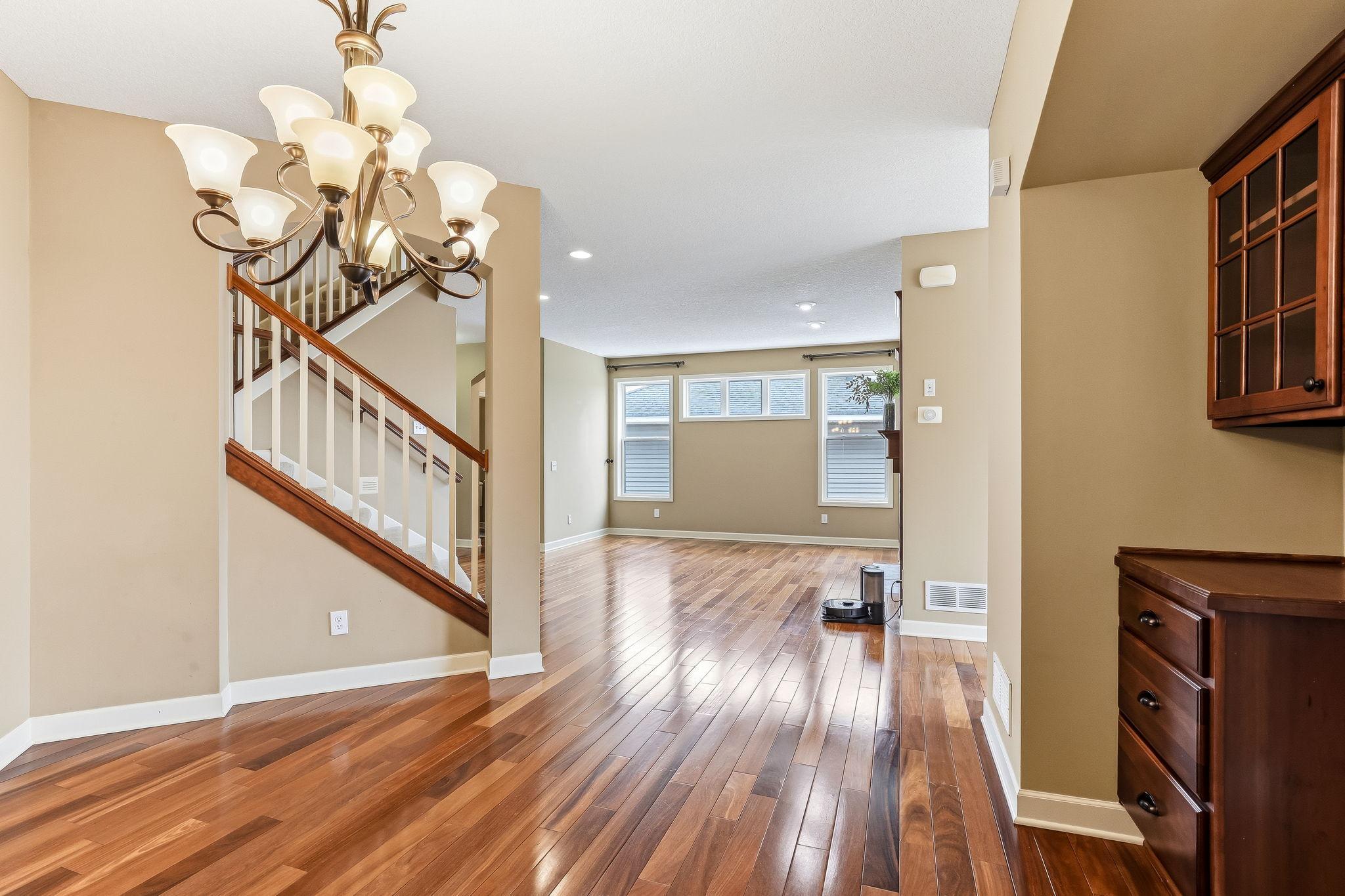 Open floor plan with hardwood floor