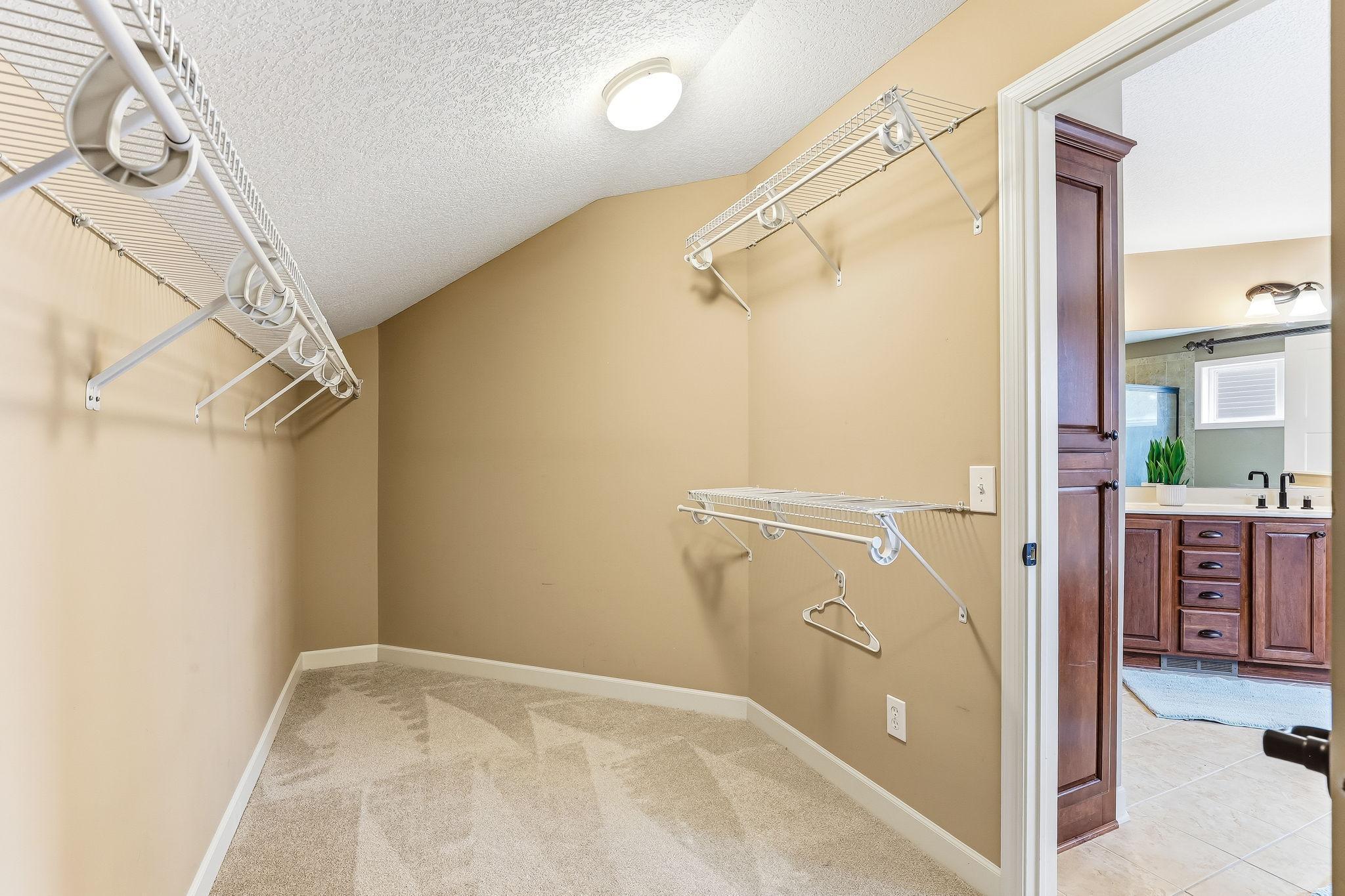Walk in closet of master bedroom