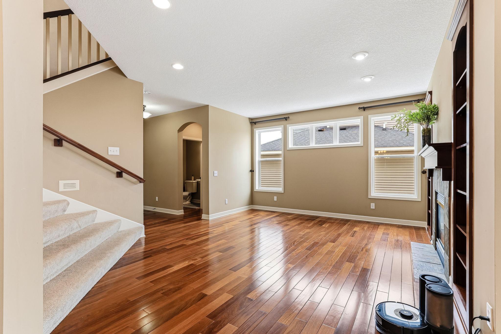 Open floor plan with hardwood floors