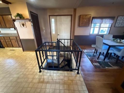 Spiral staircase going down into the bsmt