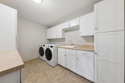 Upper level laundry room make laundry convenient.