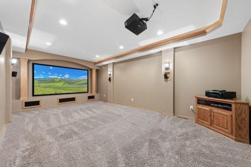 Everyone will want to watch the big game in the family theater room!