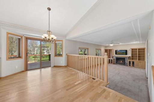 Dining area and entry have a natural hardwood flooring.