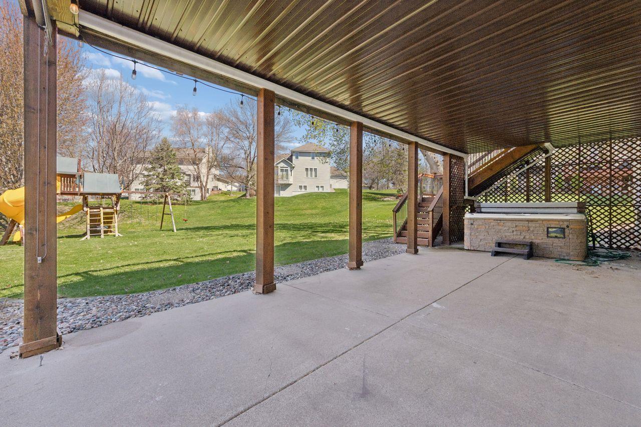 The lower level porch is accessed from the lower level and offers protection from the elements.
