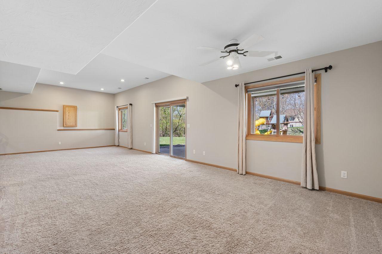 The sliding doors lead to the patio and hot tub.