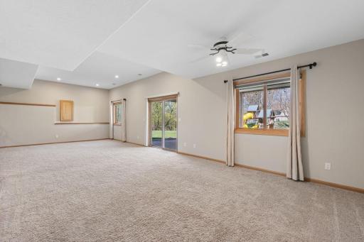 The sliding doors lead to the patio and hot tub.