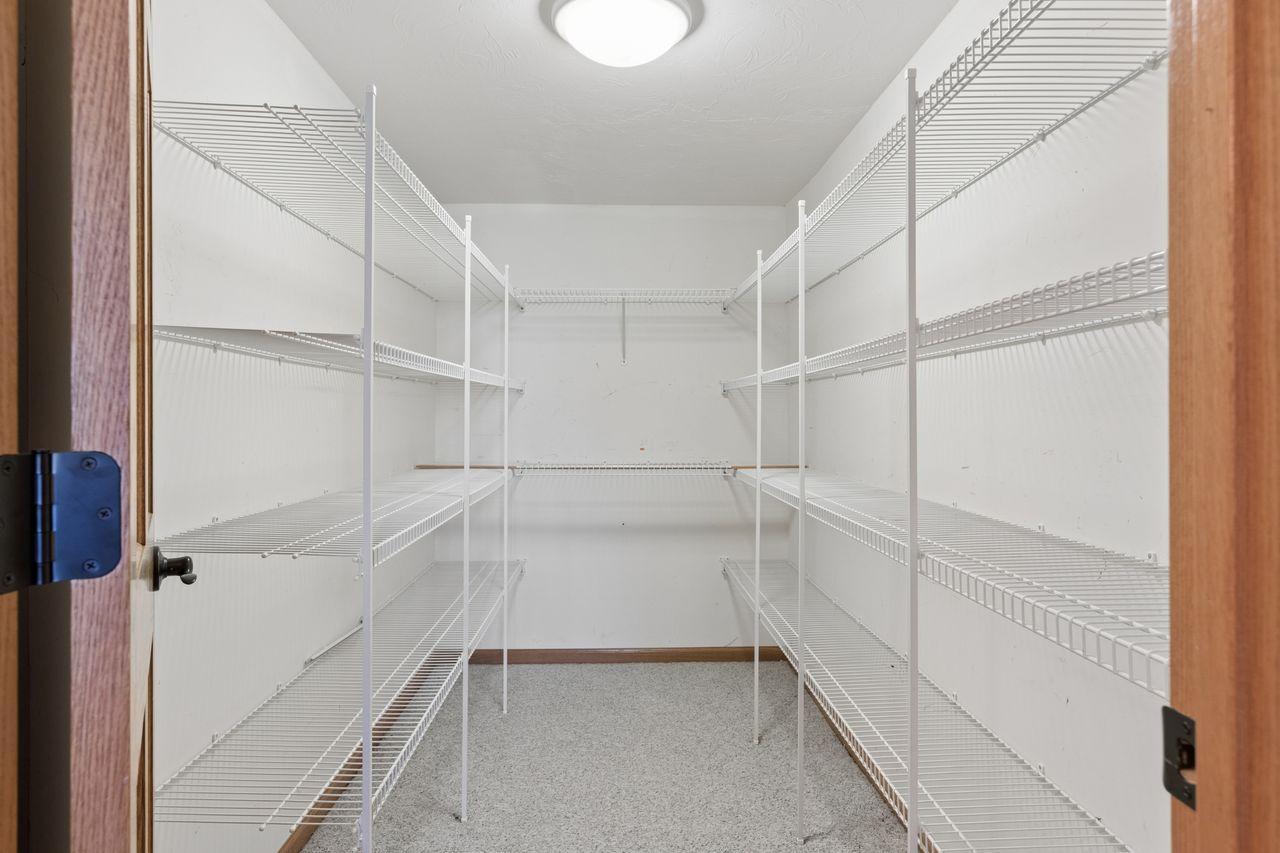 Shelving for additional storage of family heirlooms.