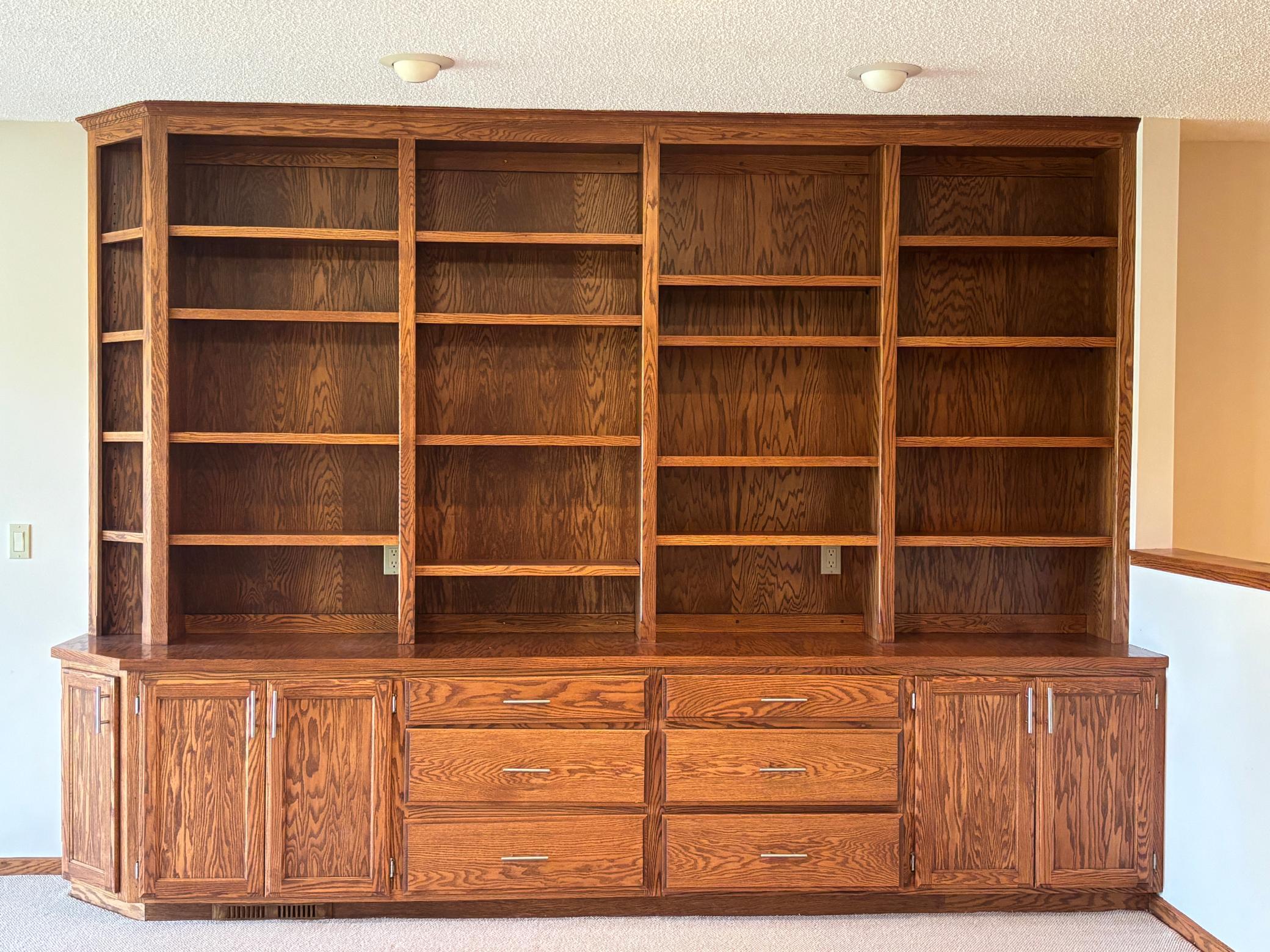 Lower Level Family Room Built in Natural Woodwork
