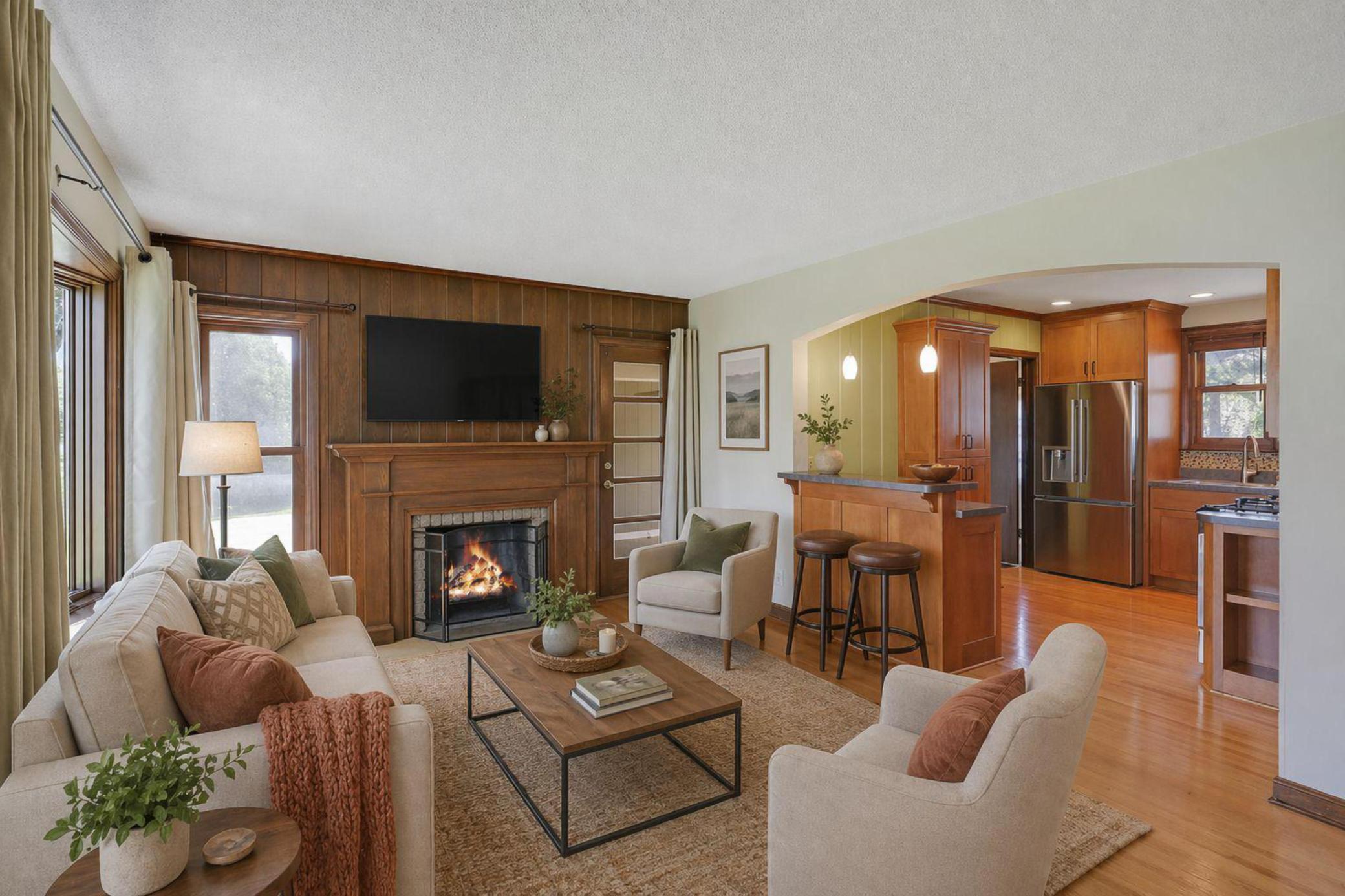 Step inside to character + charm; solid woodwork, bay window & fireplace in the living room. New bay window 2023 & new living room windows in 2020. Living room is virtually staged.