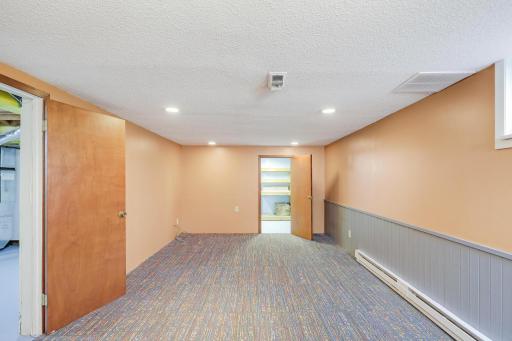 Family room with electric baseboard heating.