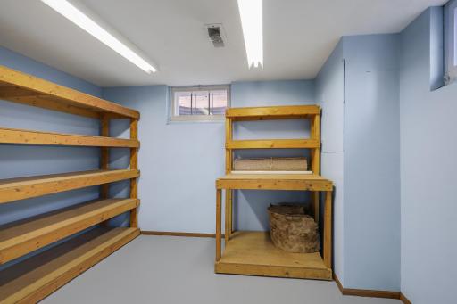 This serves as a storage room with wood shelving today. Potential 3rd bedroom if a conforming egress window is installed in the future.