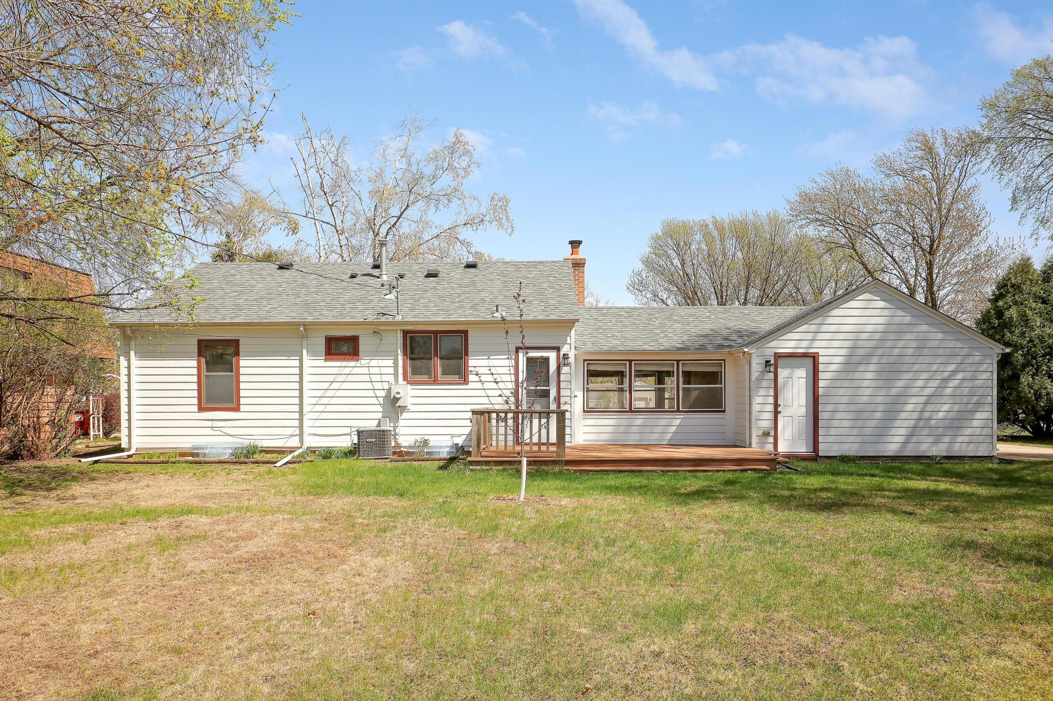 Note the door from the backyard to the garage.