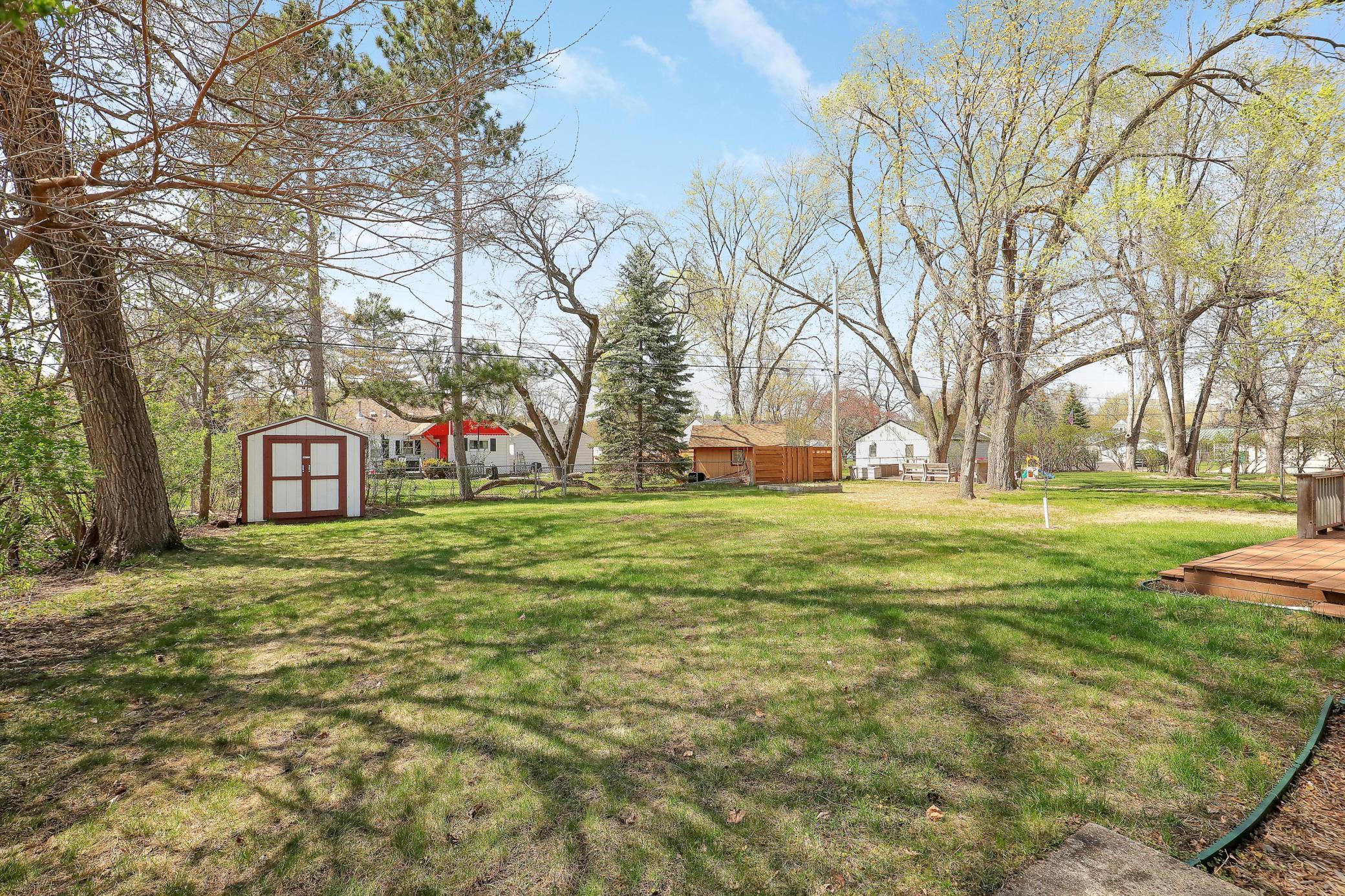 Lots of room for play or hobbies at this backyard.