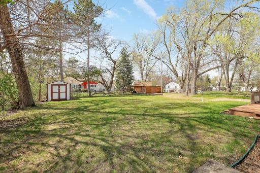 Lots of room for play or hobbies at this backyard.