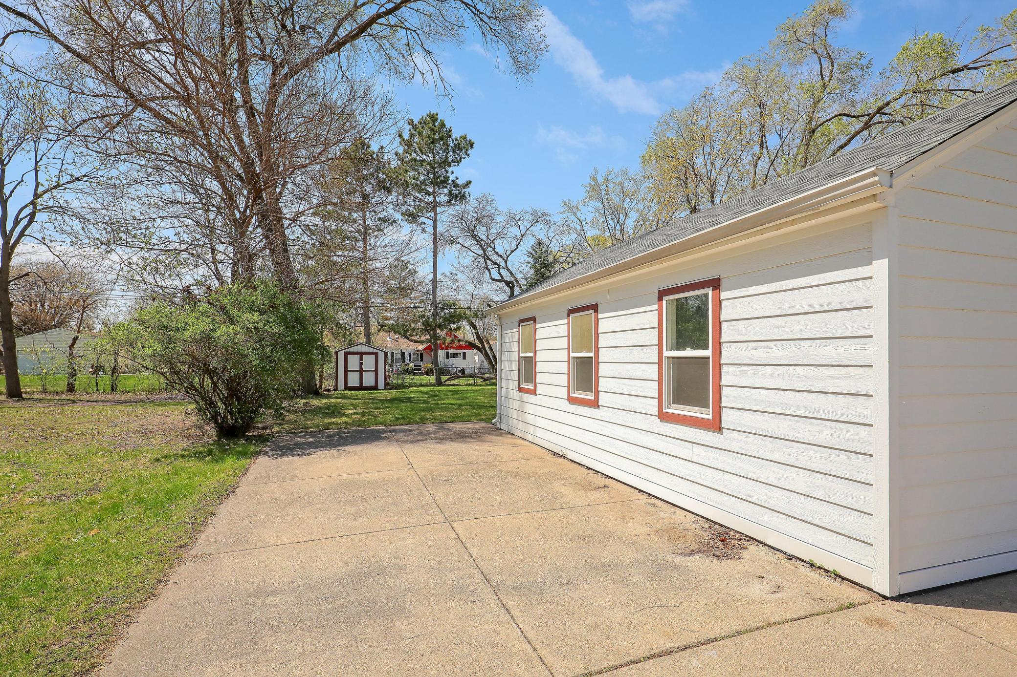 You'll find a patio or parking space at side of house, depending on your lifestyle needs.