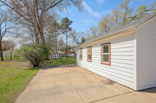 You'll find a patio or parking space at side of house, depending on your lifestyle needs.