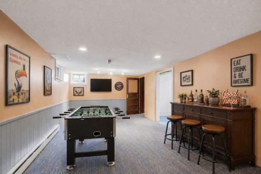 How about a foosball tournament? Same family room at lower level; but virtually staged as a recreation area.