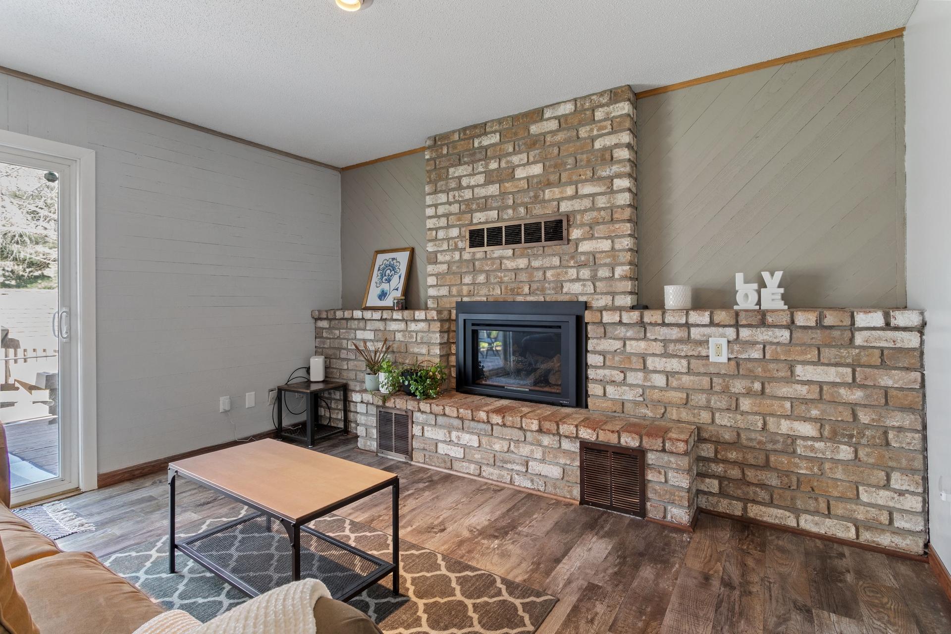 08 Lower level family room with gas fireplace.jpg