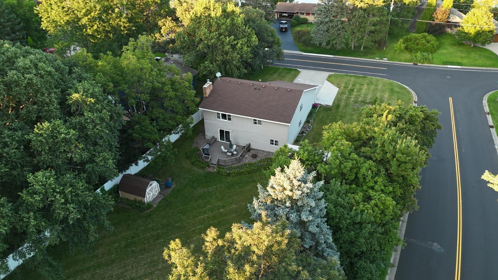 Fully fenced back yard with deck