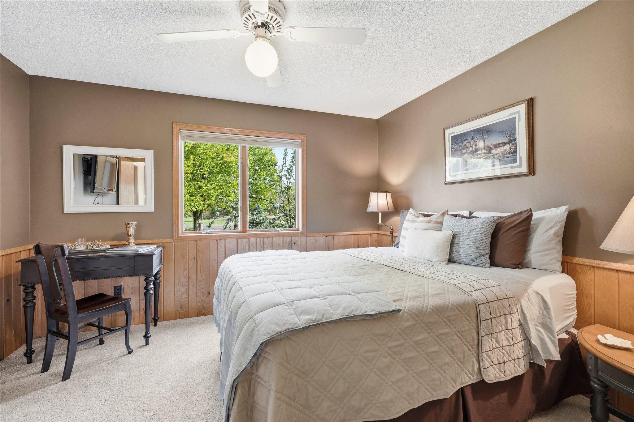 The wainscotting is oak. The carpet is new. The window is Andersen and the shade is Hunter Douglas.