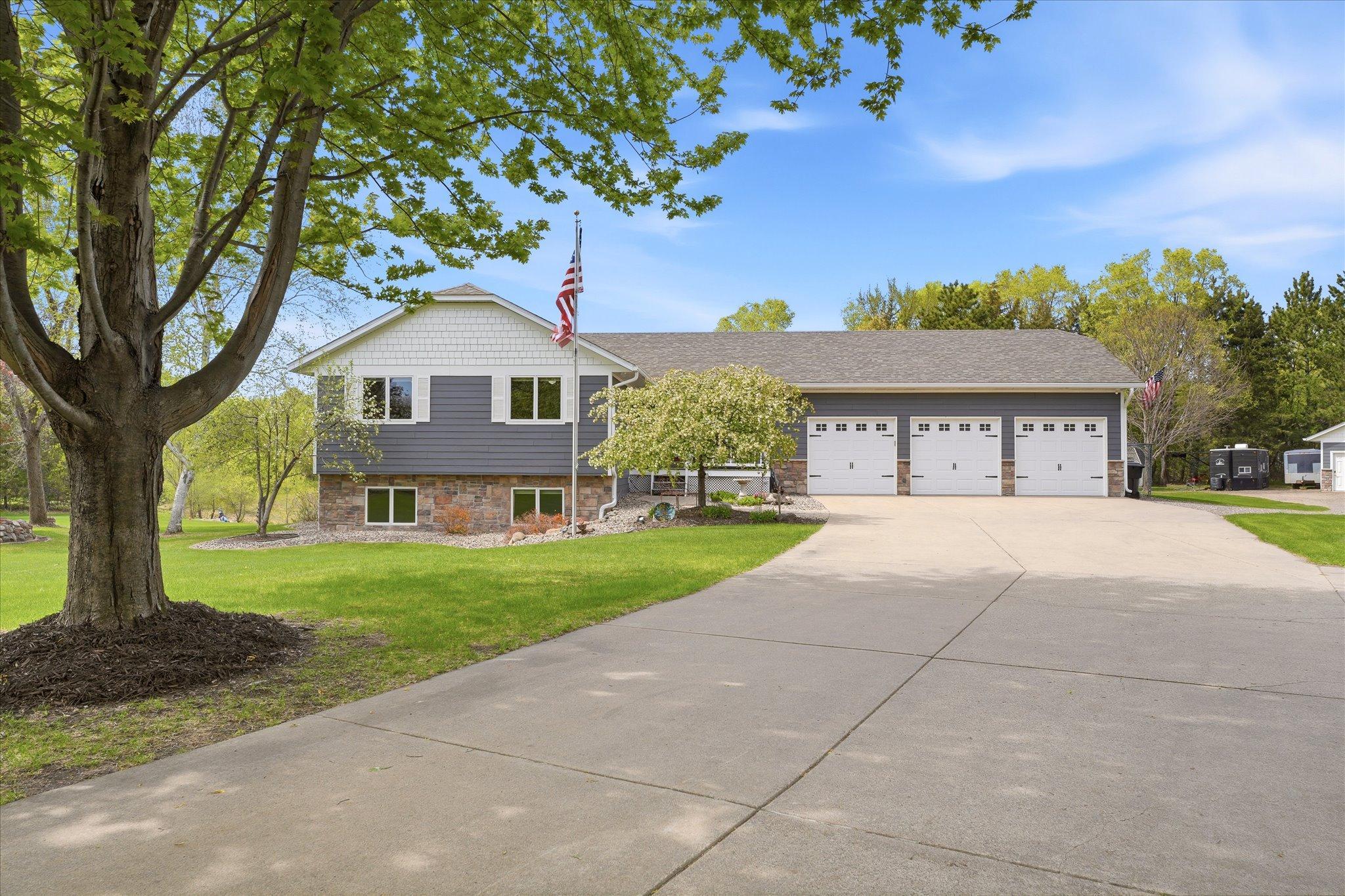 This 160-foot long concrete driveway is 16' wide at the street and 32' wide at the garage. There is also a convenient turn around about halfway in.
