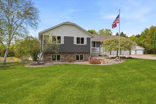 The grass is watered by an in ground irrigation system, so it stays nice & green. And because it's on a well, it costs you NOTHING!