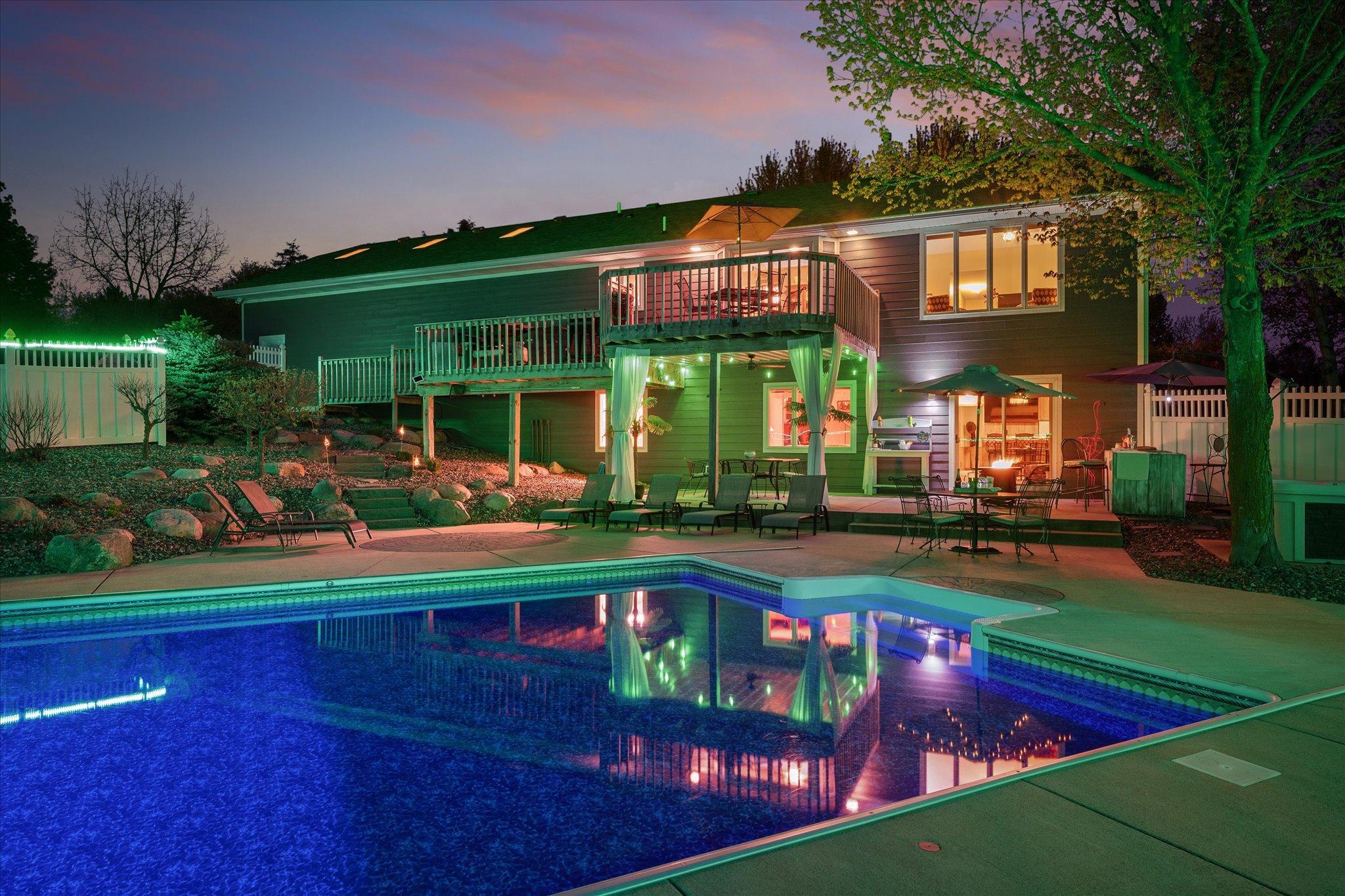 Multiple open-air patio spaces. Covered patio space. An outdoor bar. A two tier deck. Wow.