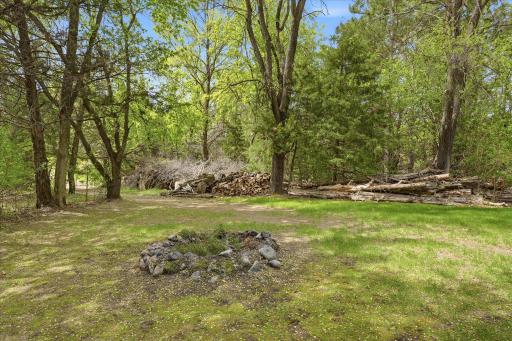 There is an in ground fire pit, and the firewood is included.