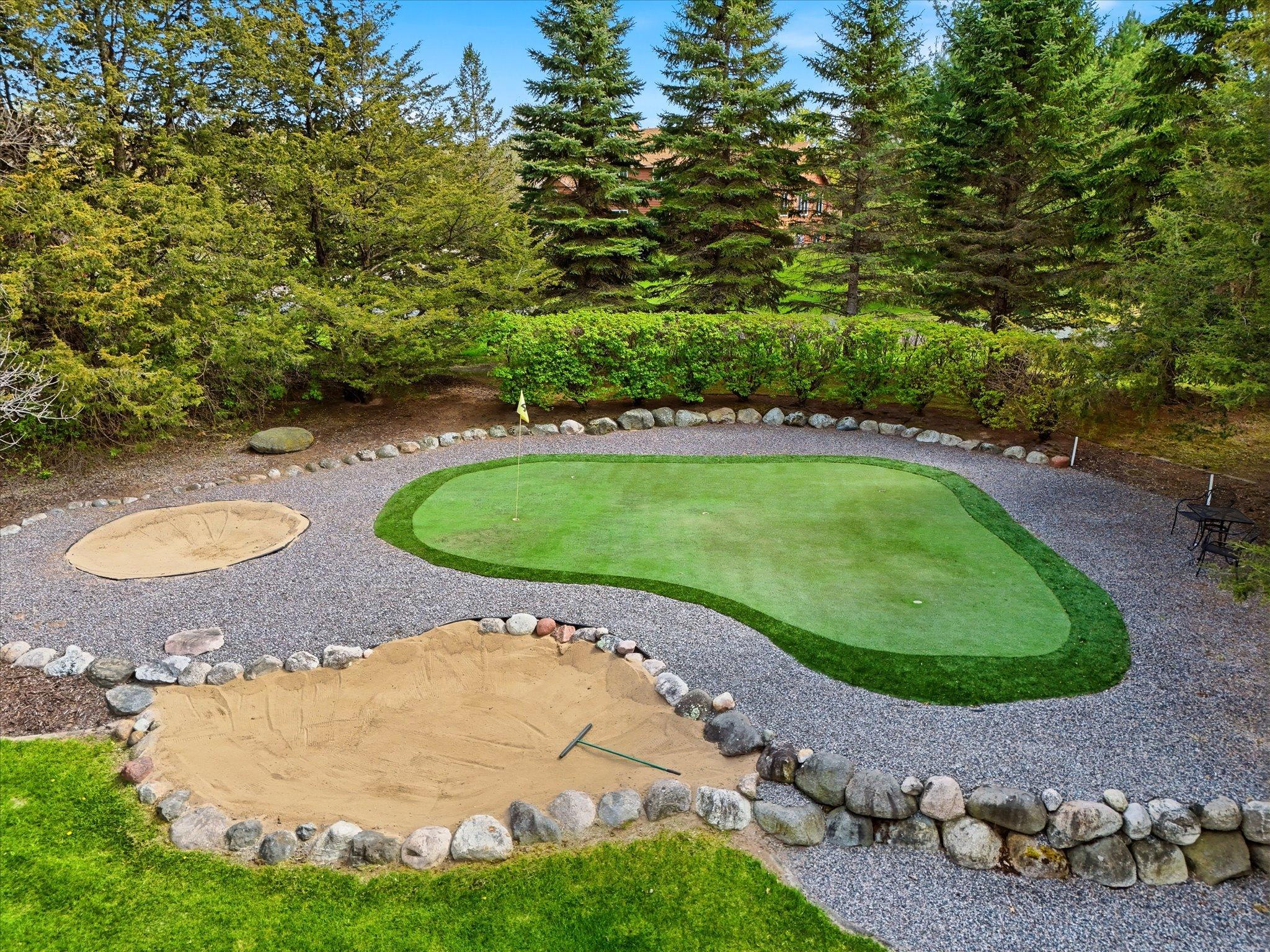 The green has 5 holes and two sand traps.