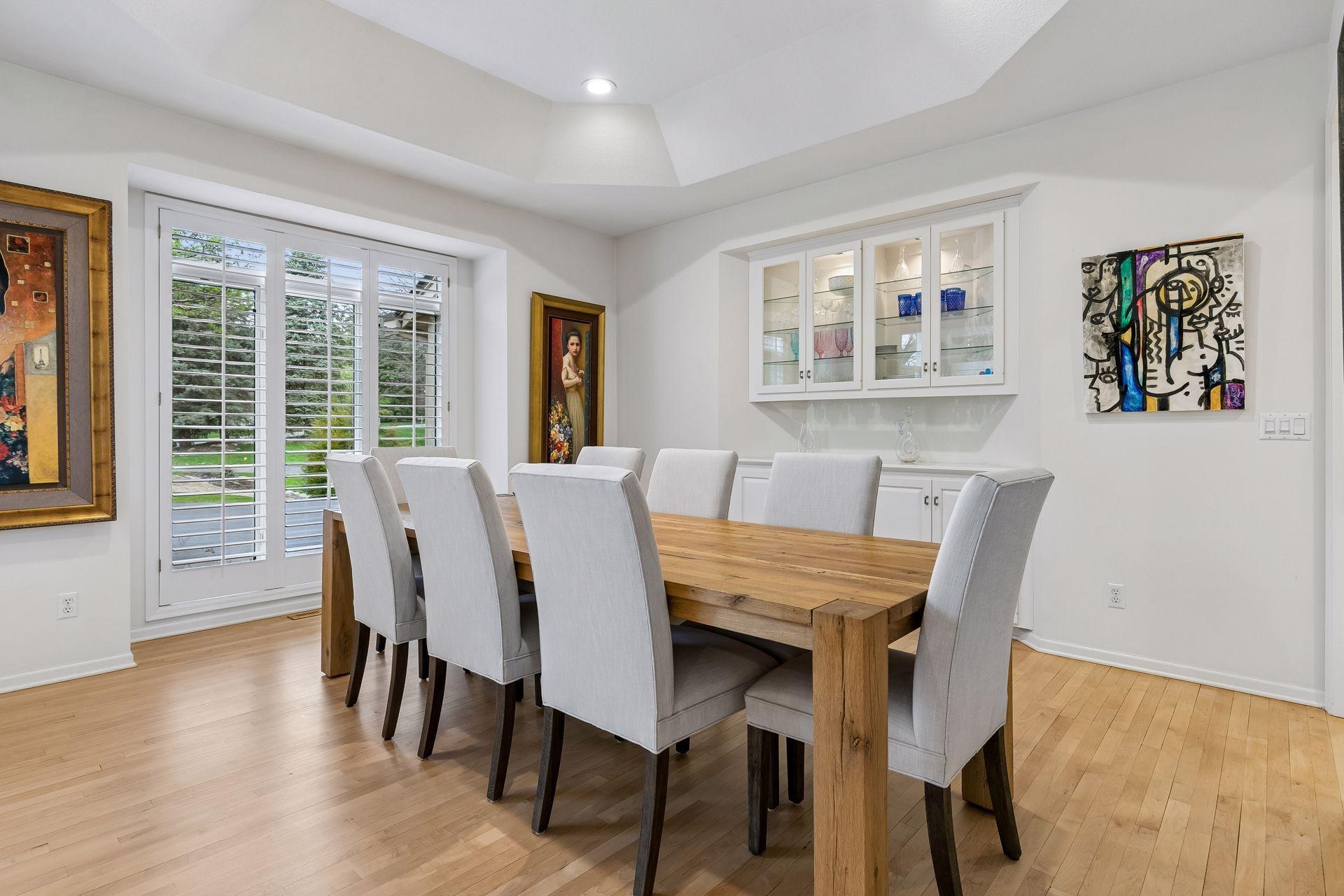 Beautiful Formal dining room, with lighted built in cabinets/buffet