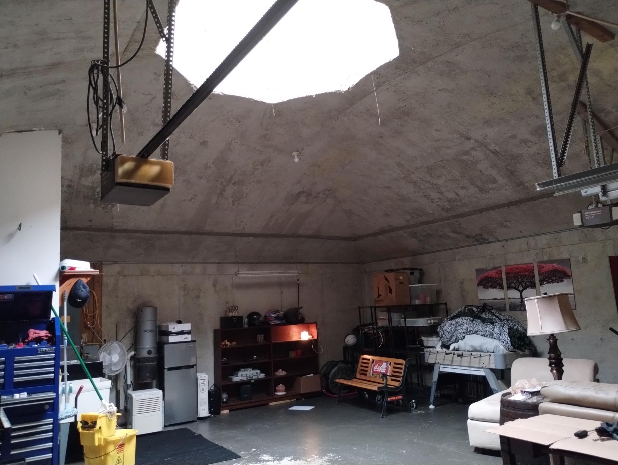 Domed ceiling with skylight in garage