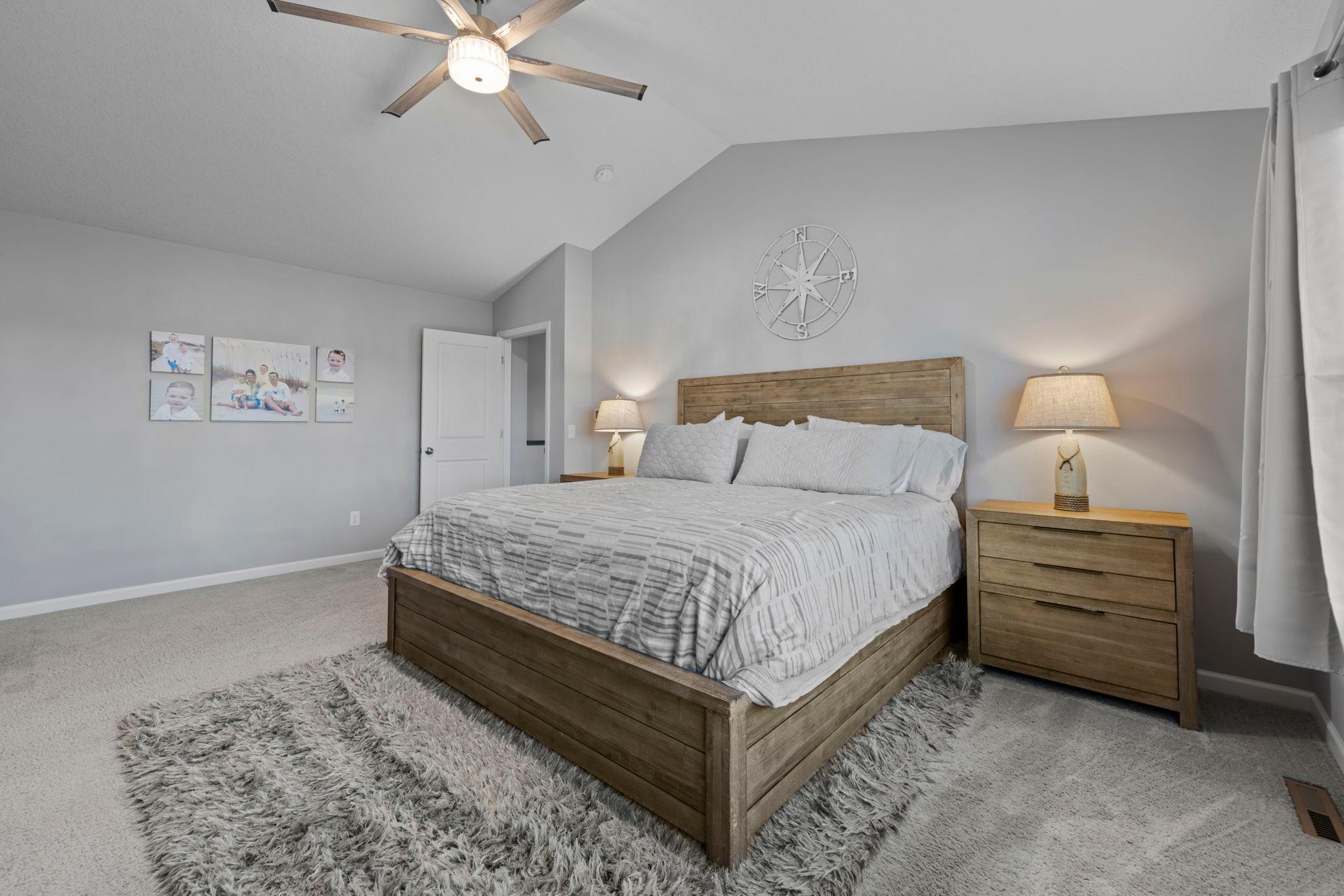 Large owner's suite with private bath and large walk-in closet. 2nd Zone for Furnace located here! Enjoy vaulted ceiling and tinted windows.