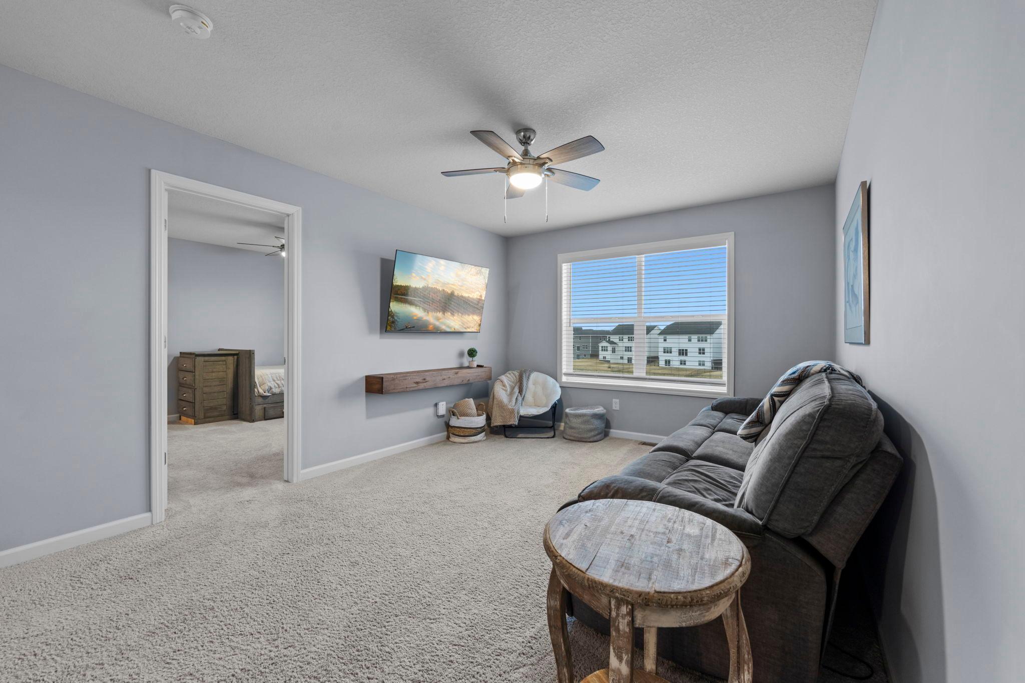 Loft between owner's suite and secondary bedrooms