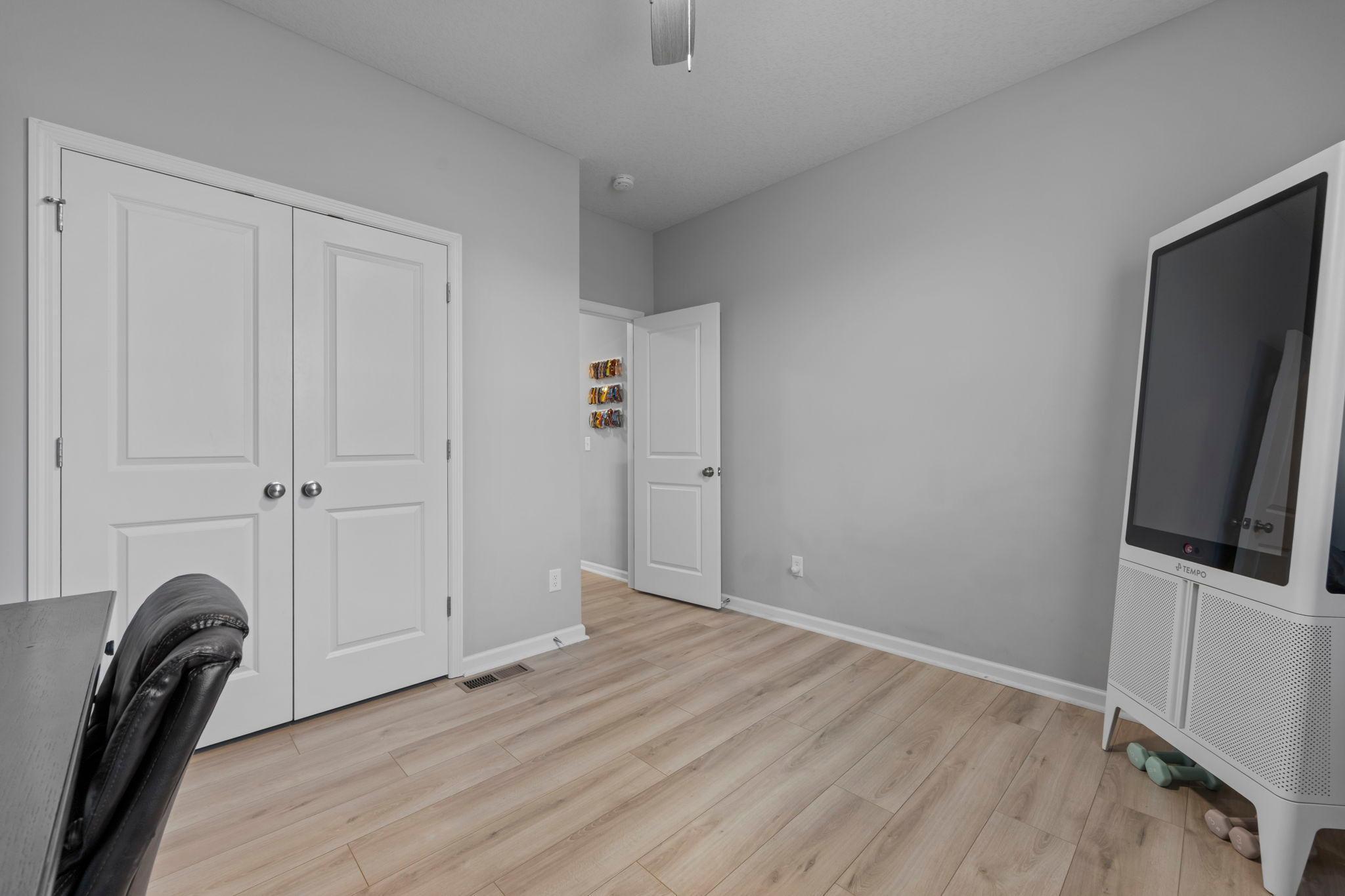 Main Floor Bedroom off of the living room, mudroom, and full bathroom.