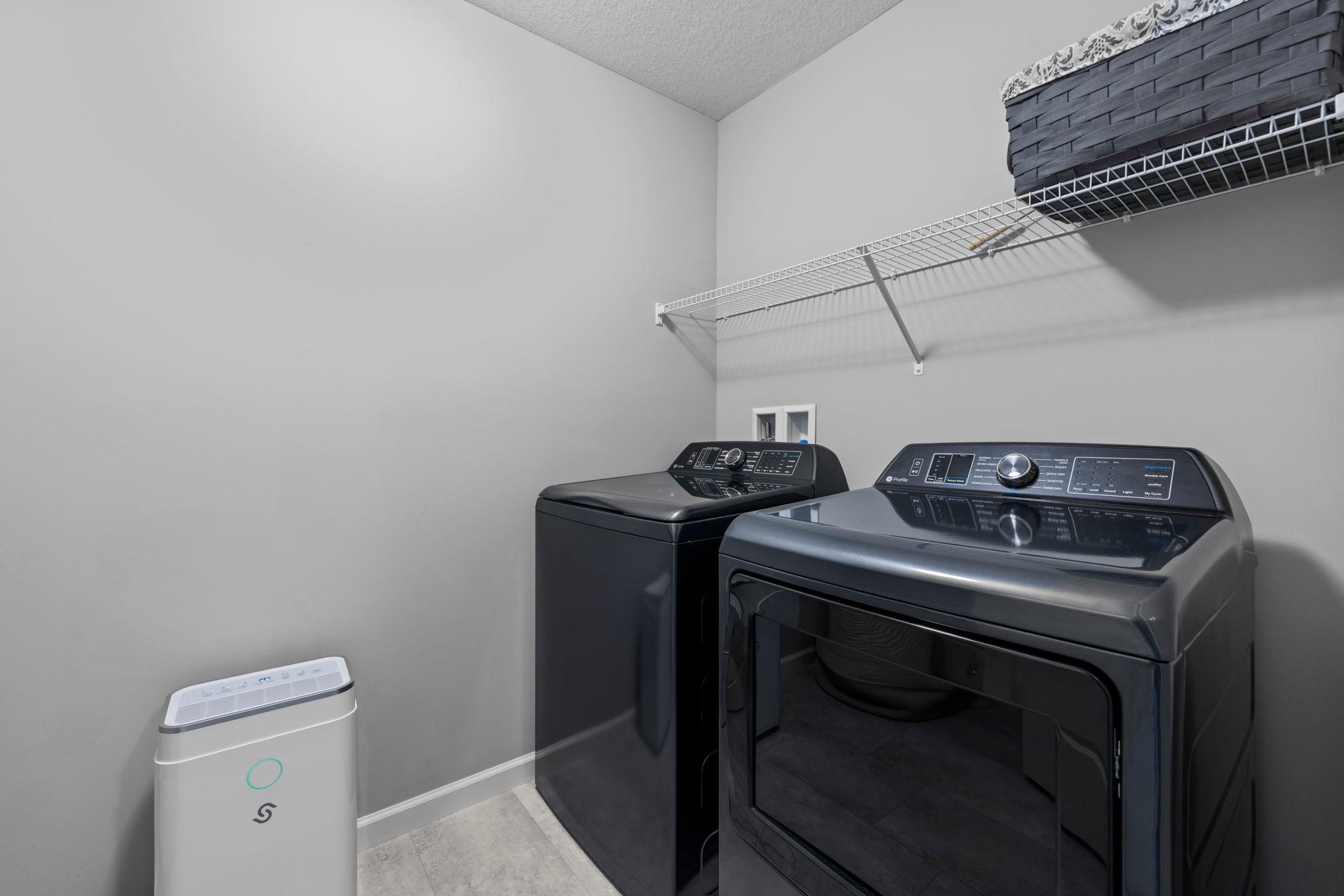 Upper level laundry room.