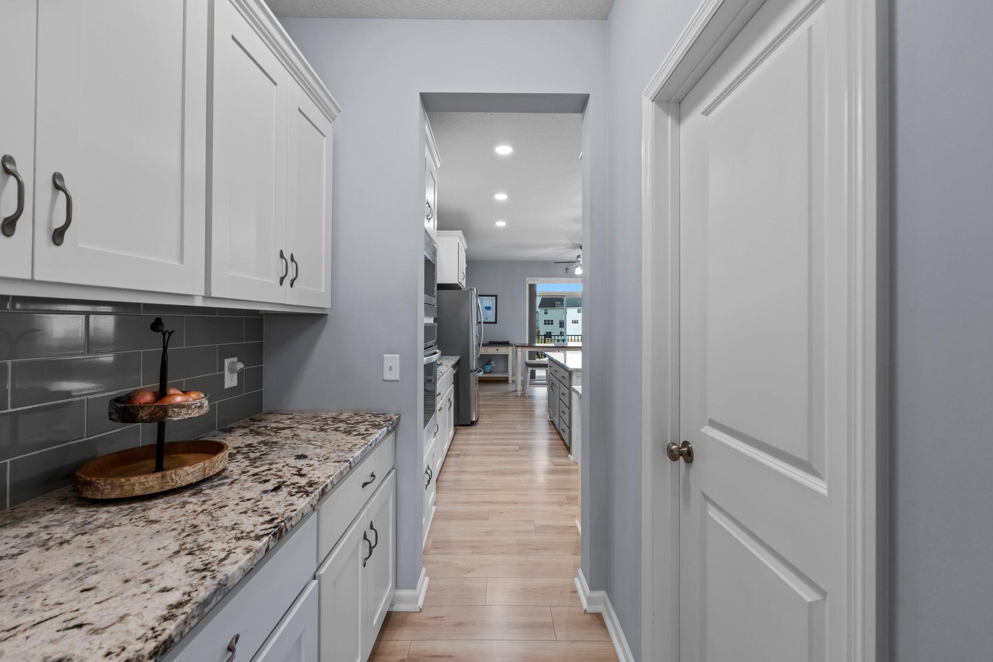 Butler's Pantry off of the Kitchen with Walk-in Pantry