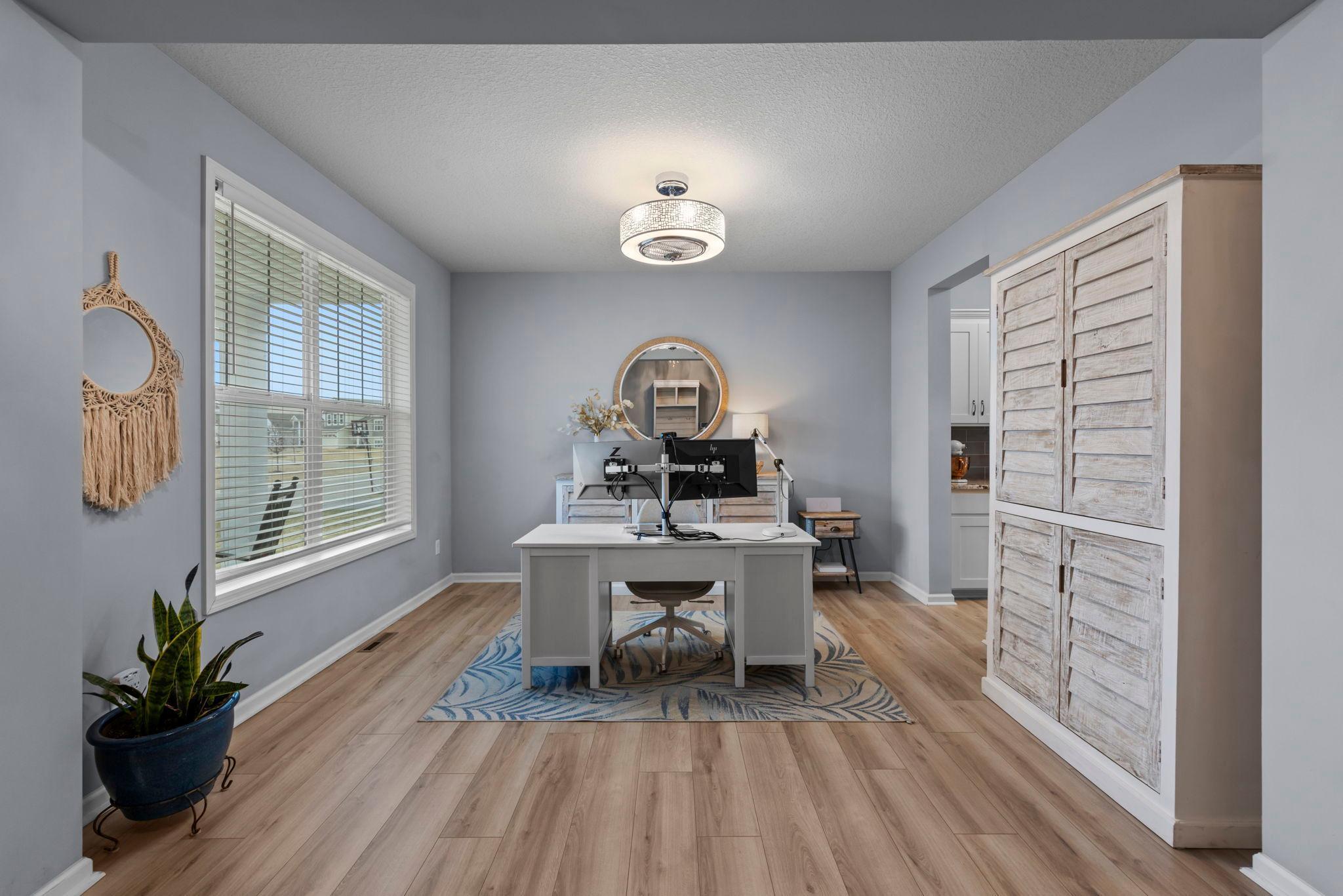 New lighting, flooring, tinted windows, custom window treatments