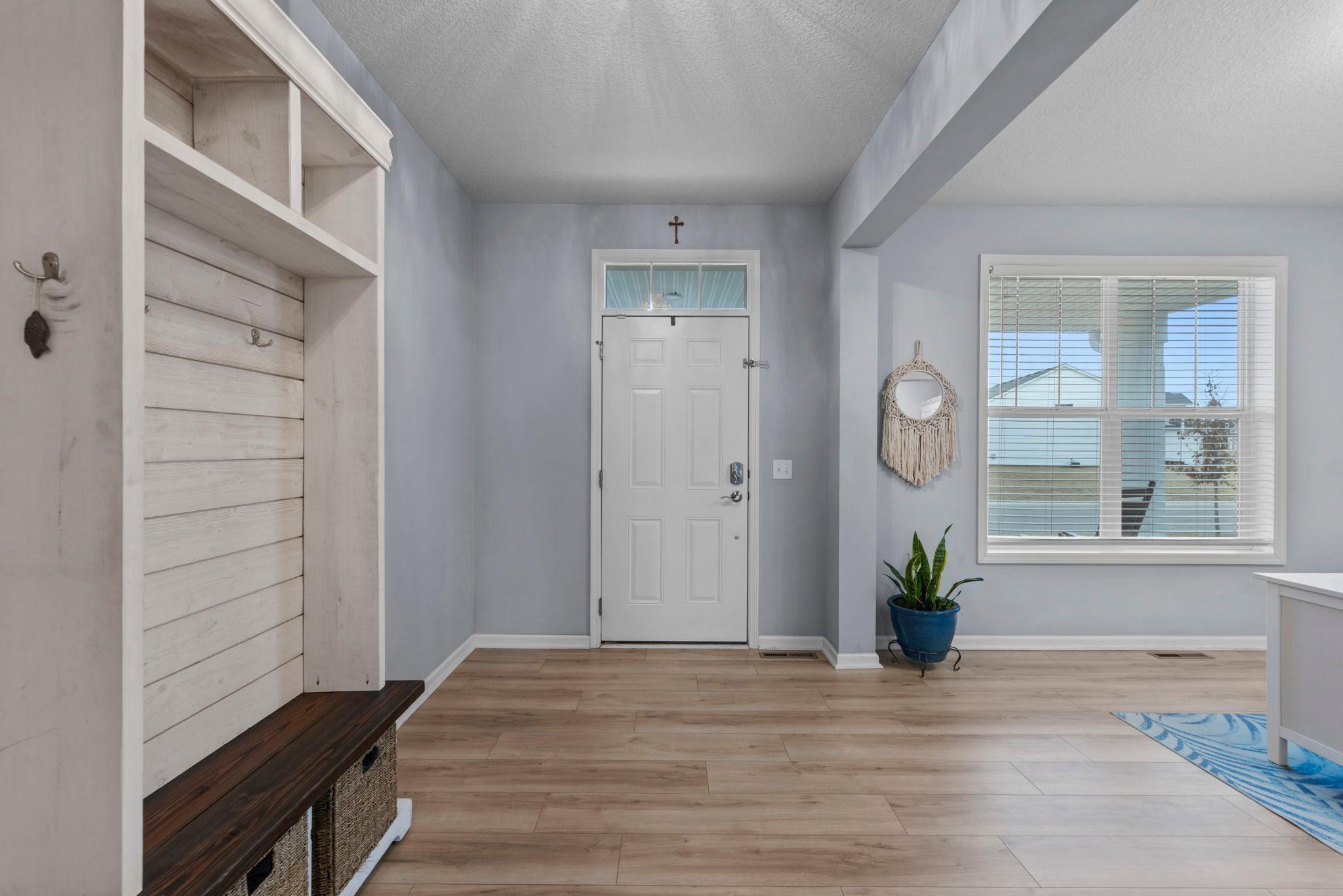 Completely redone main level flooring throughout. Builder LVT separated and was fully replaced with this stunning upgraded flooring adding more dimension and sophistication to your home!