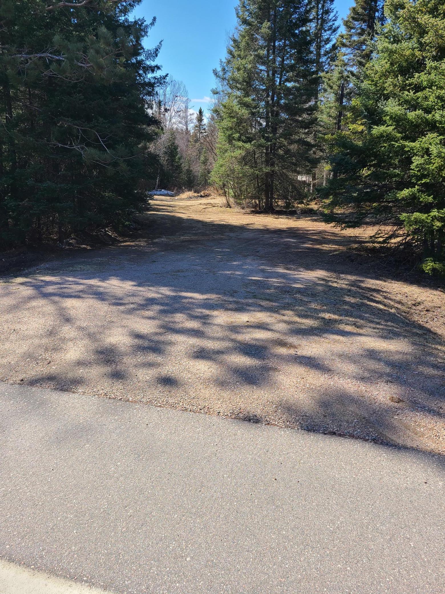 One of two driveway coming off of the road