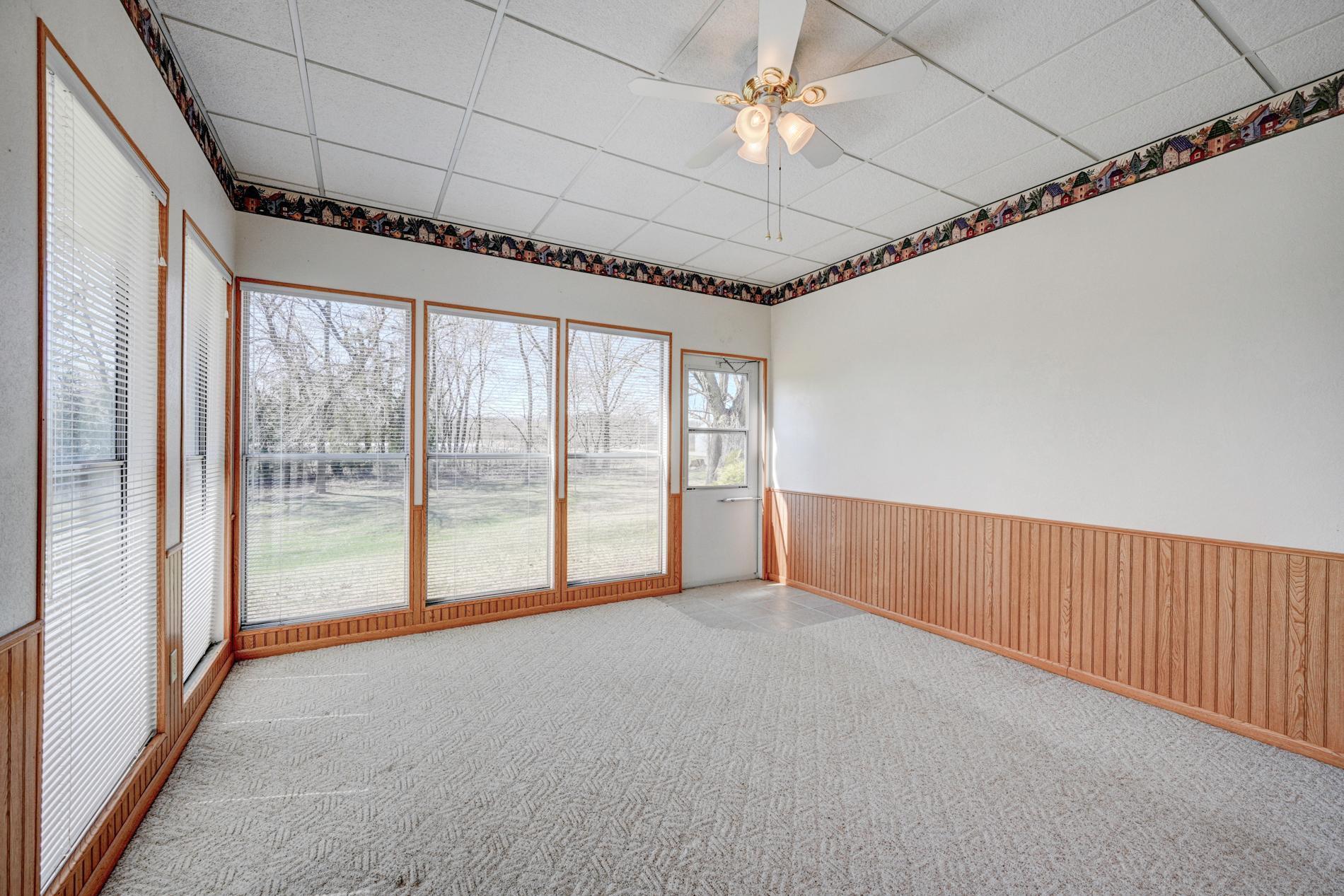 Floor to ceiling windows in the 3 season porch