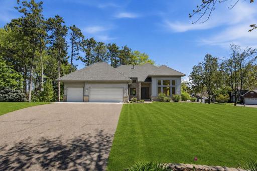 Welcome home to beautiful curb appeal on a spacious corner lot.