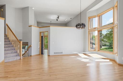 The layout offers a functional flow with defined yet connected living spaces.