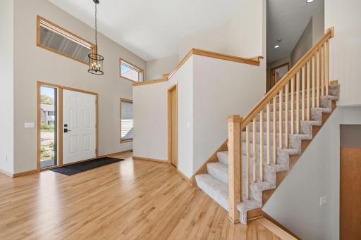 This area provides easy access to the garage, upper level, and additional living spaces.