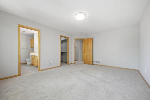 The primary suite includes a walk-in closet and ensuite full bathroom.