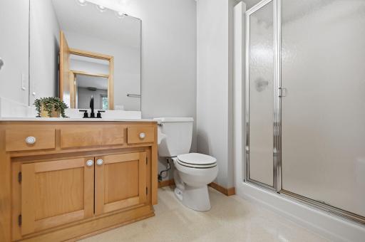 Main floor three-quarter bathroom for added convenience.
