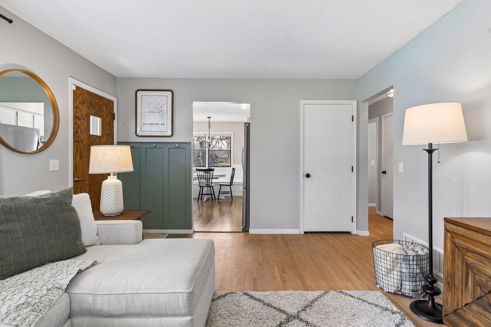 Open view from the living room into the kitchen, creating a connected and functional layout.