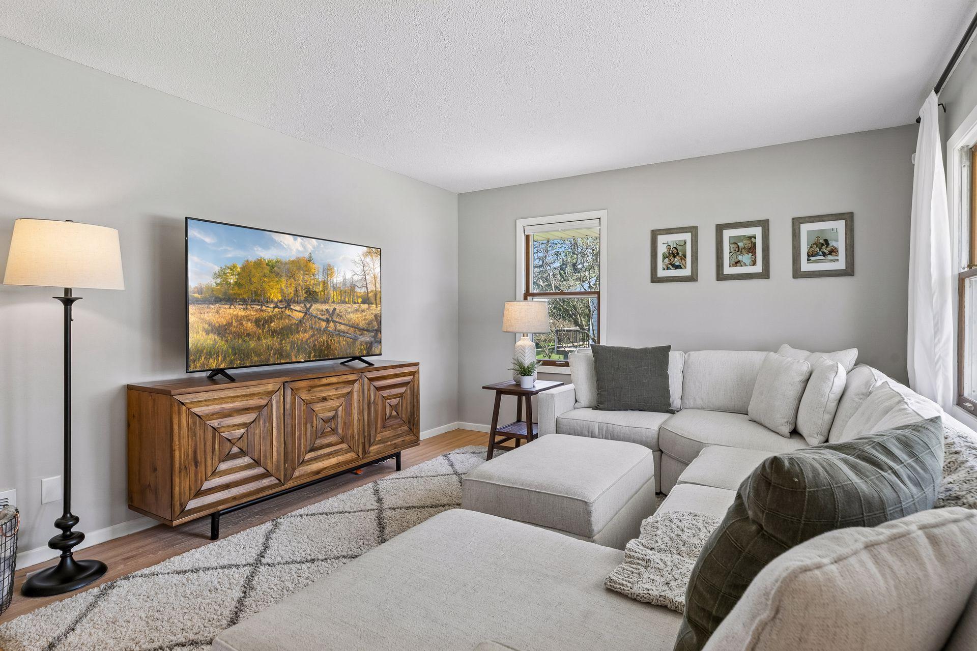 Spacious living room with plenty of room for a large, comfortable seating area.