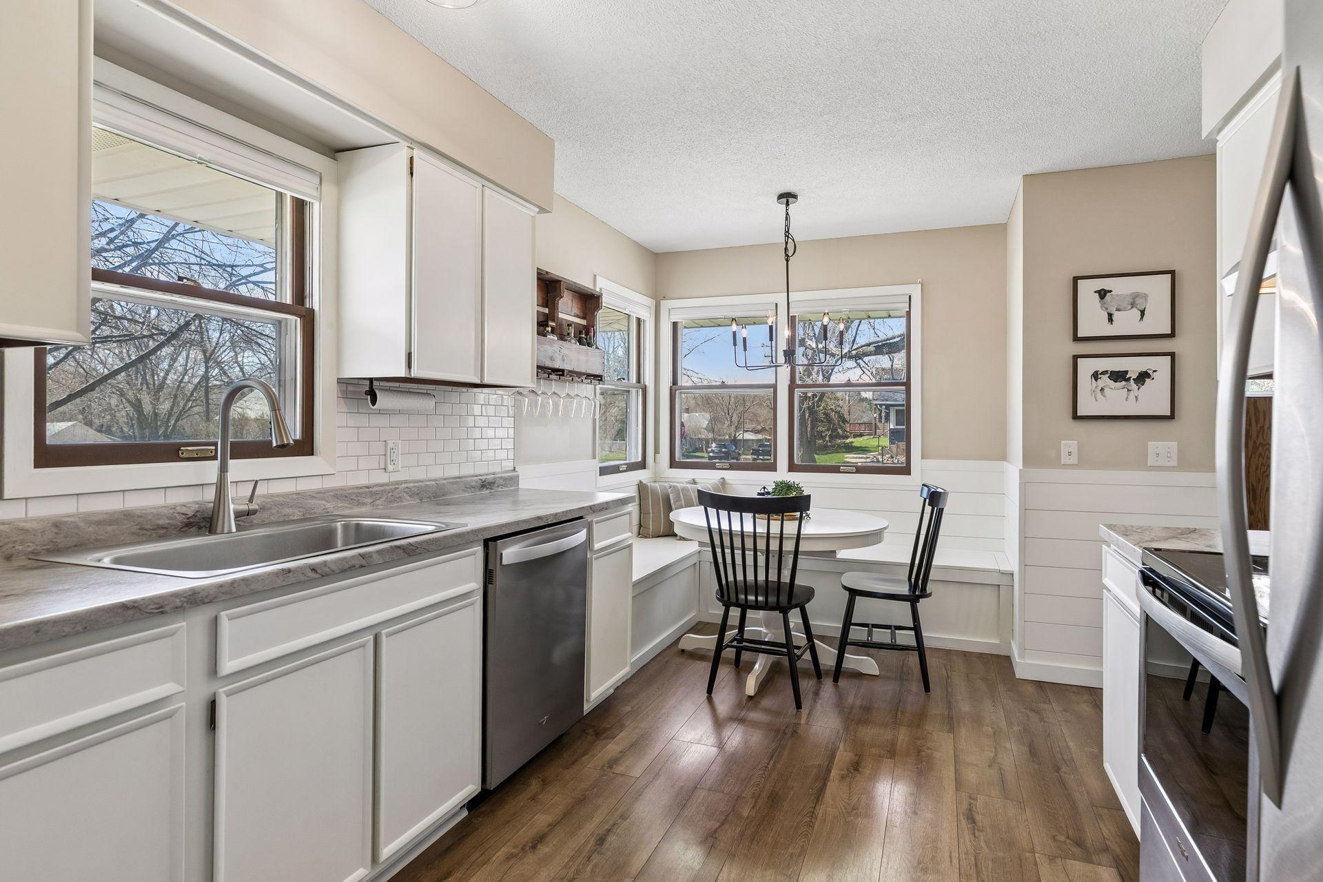 Eat-in kitchen with generous counter space, perfect for everyday living and entertaining.