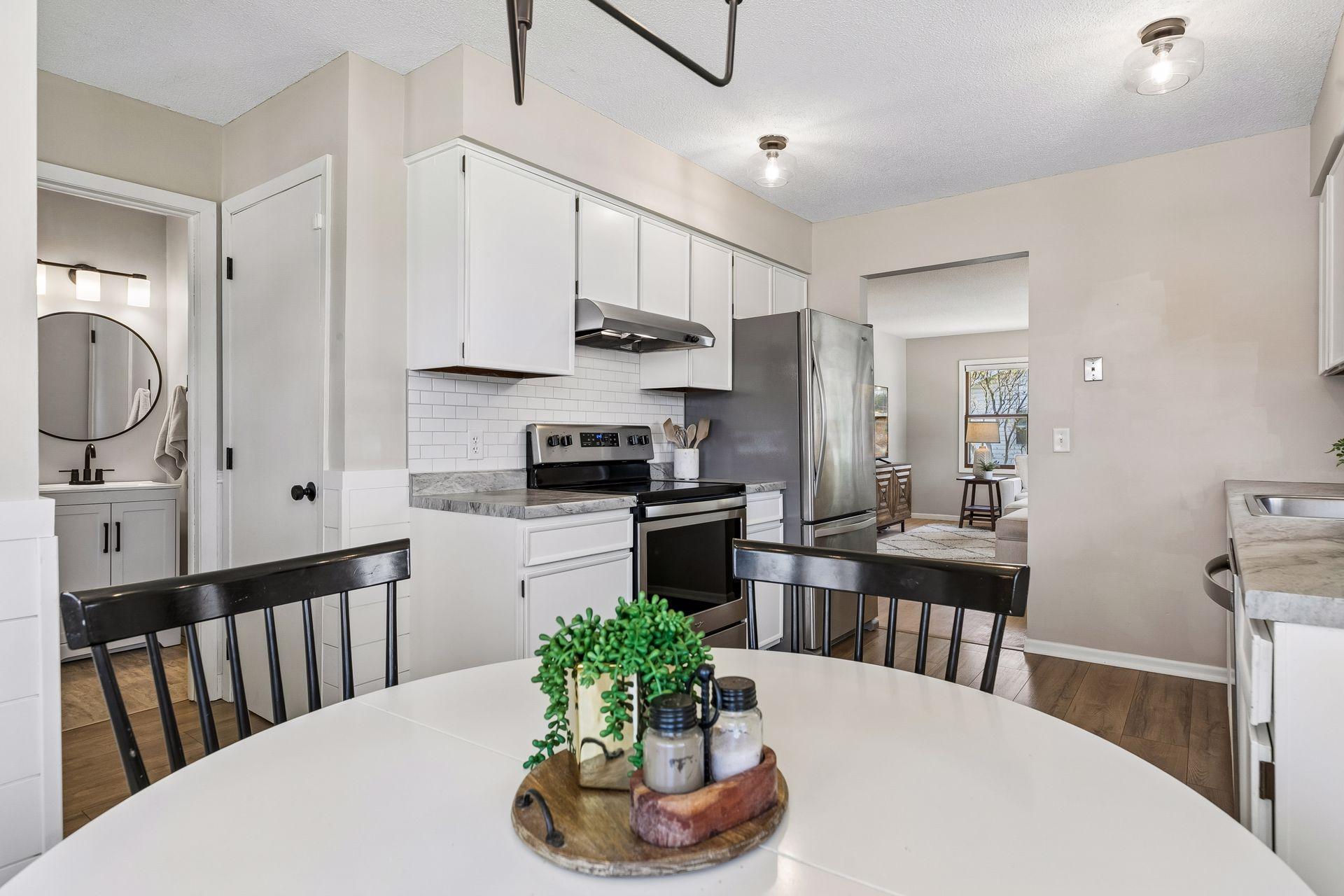 Seamless flow from the dining area into the kitchen for easy living and entertaining.