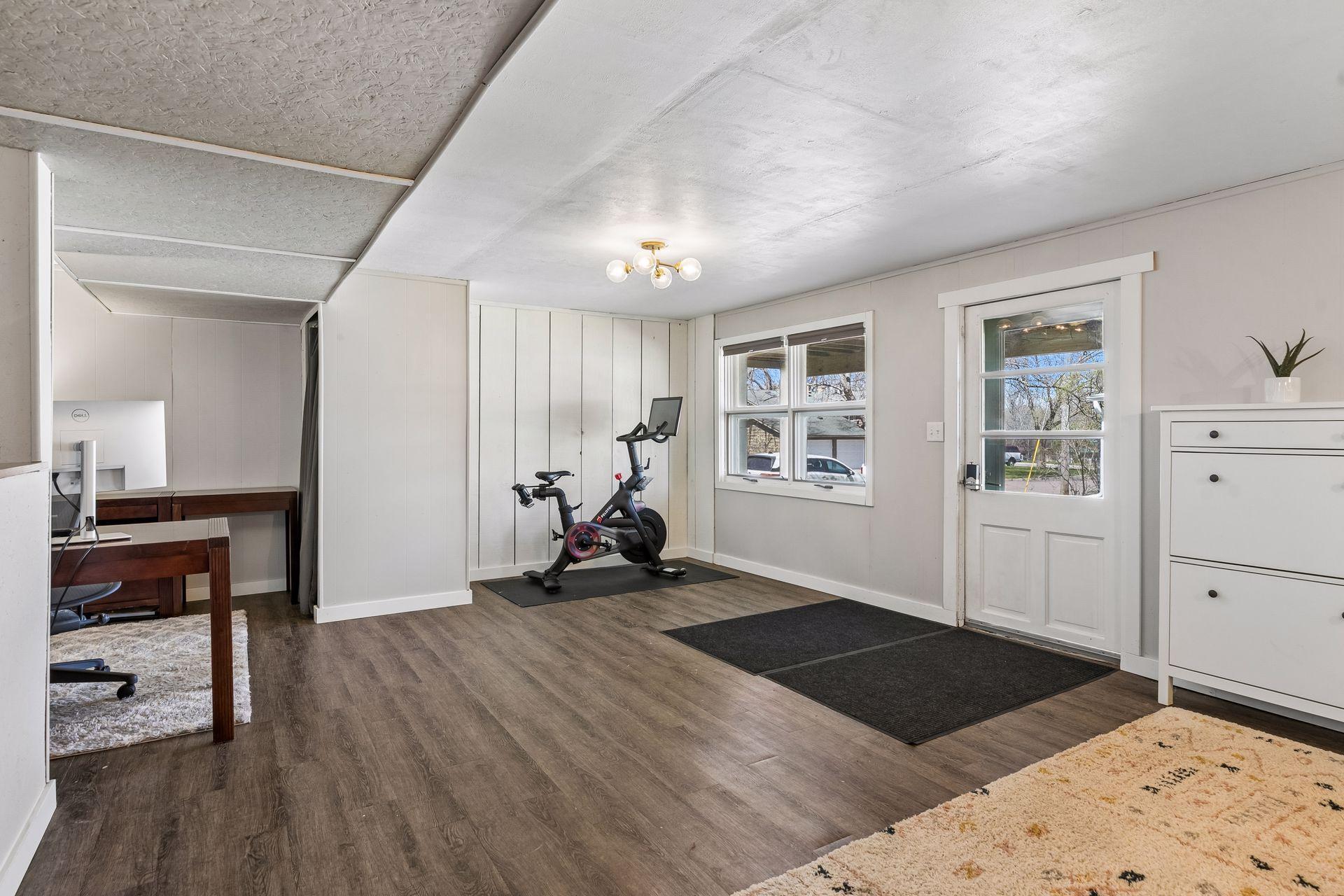 Welcome to the lower level filled with natural light from the walkout.